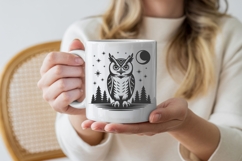 Forest night owl SVG with trees and stars printed on white ceramic mug mockup.