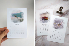 Desktop calendar 2026 nature theme featuring blooming flowers and green meadow, 10x15 cm size printable PDF JPG for office organization and wall decor.