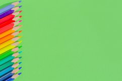 School and office supplies on office table, green background Product Image 1