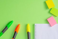 School and office supplies on office table, green background Product Image 1