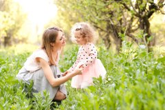 Mother with daughter outdoors Product Image 1