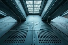 Industrial interior showing metal grid structure with skylig Product Image 1
