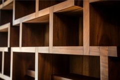 Modern empty wooden shelves on a wall Product Image 1
