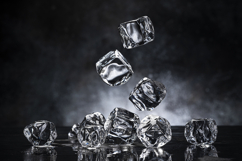 Ice cubes on black background with copy space Product Image 1