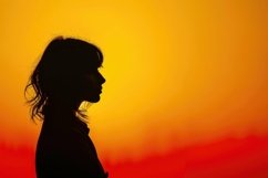 Silhouette Girl with Orange Gradient Background Wallpaper Product Image 1