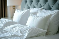 Elegant white bedding on luxurious bed Product Image 1