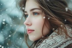 Winter serenity - portrait of a young woman amidst snowflake Product Image 1