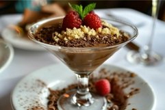 Gourmet chocolate mousse with fresh raspberries Product Image 1