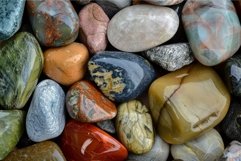 Vivid assortment of various polished, multicolored gemstones Product Image 1