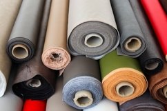 Rolled fabric samples found on a market - background Product Image 1
