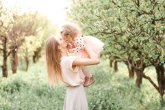 Mother with daughter outdoors Product Image 1