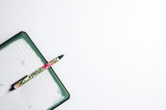 Notepad for notes. Pen on a white background. Product Image 1
