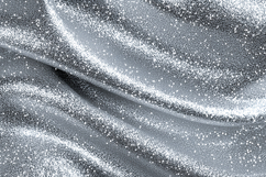 Sparkling silver fabric with glittery texture and folds Product Image 1