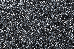 Black and white textured surface with small white specks Product Image 1