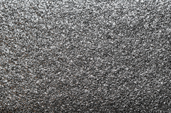 Black and white, speckled surface with a grainy pattern Product Image 1