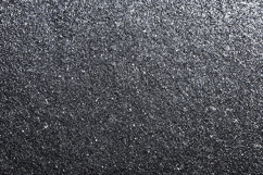 A dark gray textured surface with small white specks Product Image 1