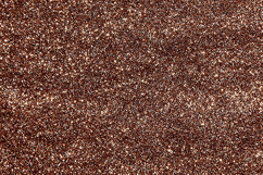 A brown glittery surface with a textured background Product Image 1
