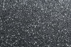 Black surface covered with white specks and dots Product Image 1