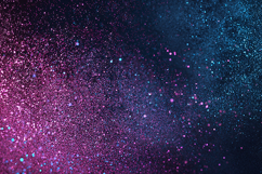 Background with pink &amp; blue glitter particle on dark surface Product Image 1