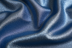 Blue fabric with a shiny metallic texture and smooth folds Product Image 1
