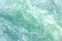 sparkling turquoise water with white foam and bubbles Product Image 1