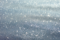 Sparkling water droplets on a gray surface Product Image 1