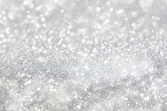 A sparkling silver glitter background with white specks Product Image 1