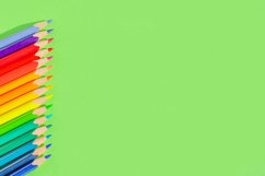 School and office supplies on office table, green background Product Image 1