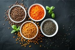 Assorted lentils in bowls on dark background Product Image 1