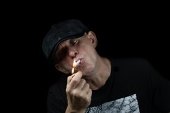 A man with a cigarette Product Image 1