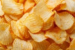 Closeup of crispy potato chips texture Product Image 1