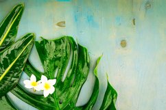 Summer flat lay scenery with tropical leaves and flowers Product Image 1
