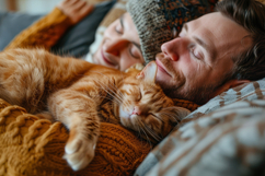Happy Couple with Cute Cat Sleeping Background Wallpaper Product Image 1