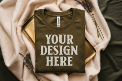 Heather Olive Folded Bella Canvas 3001 Flat Lay T-Shirt Mock Product Image 1