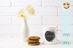 White coffee mug mockup with soft yellow orchid in vase Product Image 2