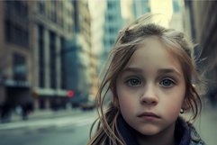 Pensive child in urban setting Product Image 1