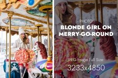 A blonde girl is standing on a carousel with two lollipops Product Image 1