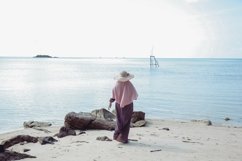 Woman on the beach Product Image 1