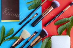 premium makeup brushes and blush on a colored background Product Image 1