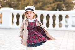 Stylish baby girl in park Product Image 1