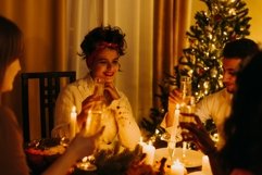 An Afghan woman makes a toast on Christmas night. Product Image 1