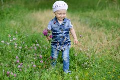 Cute baby girl on a walk in the Park Product Image 1