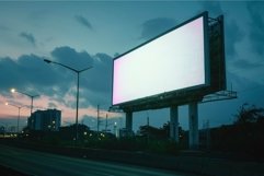 Large blank billboard by the road at dusk with dramatic sky Product Image 1