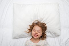 White pillow mock up with smiling girl Product Image 1