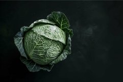 Fresh green savoy cabbage on a black background Product Image 1