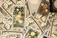 Tarot cards on fortune teller desk. Magic rituals Product Image 1