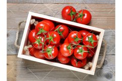 Tomatoes in wooden box top view Product Image 1