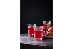 Pomegranate juice on the black background Product Image 1