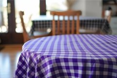 Cozy kitchen table with checkered tablecloth Product Image 1