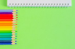 School and office supplies on office table, green background Product Image 1